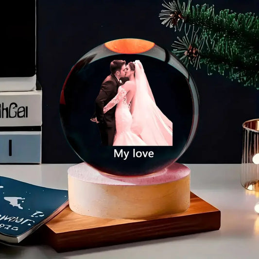 An all night light with a wooden crystal ball engraved to your taste